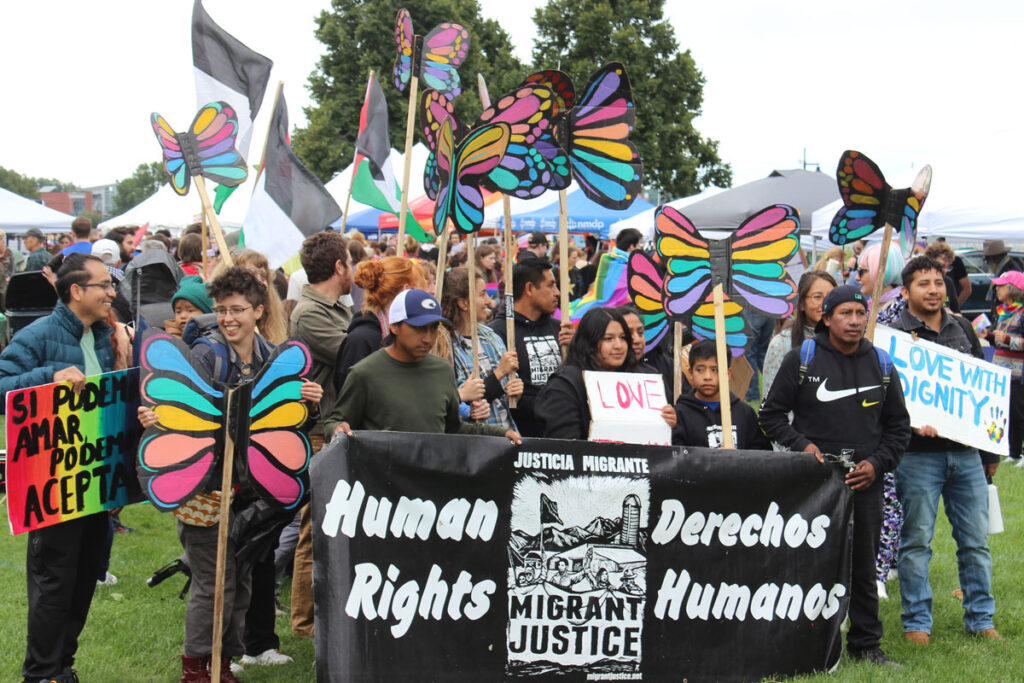 Members of Migrant Justice pose for a photo at Burlington Pride